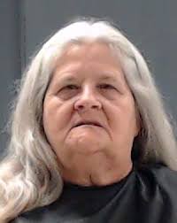 Three officials surrender