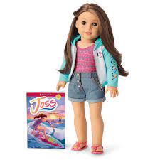 15 tall with light skin, brown hair, and green eyes that open and close. Joss Doll Book American Girl