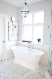 Light And Bright Master Bathroom With Benjamin Moore Sleigh Bells Walls Marble Herringbone Floor Bathroom Interior Design Bathroom Flooring Bathroom Interior