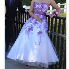Embellishments such as rhinestones and pearls are also added to the dresses. Dresses White Prom Dress With Purple Details Poshmark