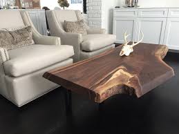 Custom live edge walnut coffee table with cage style base to hold customer's baseball collection. Salvaged Wood Finds New Life As Custom Furniture And Home Accents