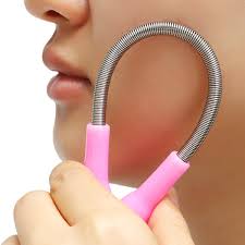 An oblong plastic handle helps position a nest of metal coils above one's furry skin. Facial Hair Removal Stick Epilator Women Face Care Tool Tightly Coil Spring Silicone Face Washing Brush 1pc Sale Spring Sale Spring Womenspring Facial Aliexpress