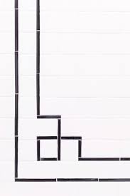 You can use two different colors of subway tile in a pattern or use a contrasting grout color to make the tiles pop. Tile Hacks With In Stock Tile The Makerista