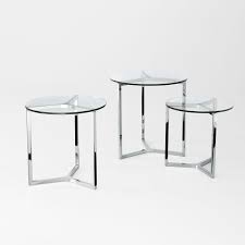 Interlocking squares come together to create a unique geometric patterned base that supports the solid wood tabletop. Raj 2 Glass And Metal Side Table By Gallotti Radice Klarity Glass Furniture