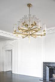 Liaison Triple Tier Chandelier By Kelly Wearstler In 2021 Brass Light Fixture Creative Lighting Fixtures Chandelier In Living Room