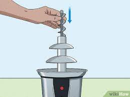 If you aren't using chocolate made for a fountain, add oil to the chocolate before adding it to the fountain (the ratio is 55% chocolate and 45% oil). How To Use A Chocolate Fountain With Pictures Wikihow
