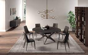 There's only space for 2 wheelchairs on each bus. The Big Round Expandable Dining Table By Ozzio Italia At Trade Source Trade Source Furniture