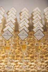 Find out how you can put a creative spin on your reception you can have the winery name card inserted into these cool wine bottle table number holders from wire. Creative Wedding Favors Wedding Favors For Wedding Party Decorations For Weddings Wedding Seating Cards Seating Chart Wedding Wedding Name Cards