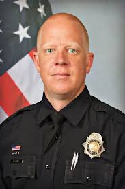 MEDAL OF VALOR: OFC. CAIRNS Officer Brent Cairns while preparing for a  “Walk the Beat” shift