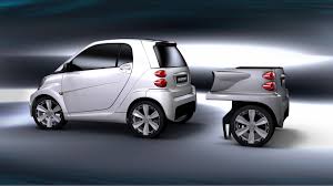 The 12v battery that powers the car's electronics is located under the hood against the firewall. Rinspeed Adds Axle Battery Pack To Smart Electric Drive Roadshow