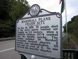 Marshall coach rick tolley demonstrating a move to team captain dave griffith, mike blake and dave debord (left to right) in 1970. Remembrance Planned For 1970 Marshall Plane Crash Victims