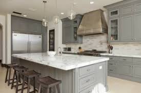 The kitchen wall is gone and the bright colors of the cabinets help light up the room, as well as the additional light from the dining blue kitchen with custom cabinets and colorful backsplash. Best Paint Colors For Kitchen Cabinets And Bathroom Vanities