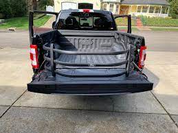 The new interior work surface gives you a big, flat deployable surface that you can use as a ford. Ford Branded Amp Research Bed Extender Installed F150gen14 Com 2021 Ford F 150 Lightning Ev Raptor Forum 14th Gen