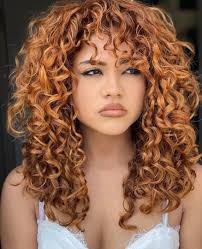 Who else is obsessed with these copper curls? 😍 We're loving all of the  soft ginger, gold and auburn #crafthaircolor undertones by curly hair  specialist @rosicurls! Her @wellahairusa formula: Roots: 8/41 +