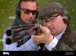 Clay shooting guns hi-res stock photography and images