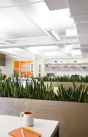 Day One A Digitally Driven Marketing Agency That Focuses On Digital Marketing Public Relation And S Green Office Decor Agency Office Corporate Office Design