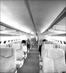 An Interior View Of The Mockup Of Boeing 737 In Renton In 1966 Several Boeing Employees Are Seated In The First Class Secti Vintage Airlines Boeing Boeing 737