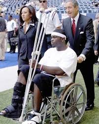 tbt Michael Vick getting pushed in his Wheelchair by owner Arthur Blank