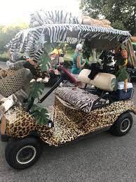 In addition to collecting money at each stop, participants also picked up a playing card. Jungle Theme Golf Cart Jungle Theme Golf Carts Golf Cart Decorations