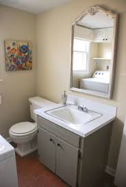 Haven't decided on color yet. Painting A Bathroom Vanity And Cabinet And Spray Painting Hardware One Cherry Tree Lane