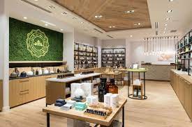 The Geometric Patterned Oak In The Storefront And Interior Ceiling Bring An Element Of Modernity To A Traditional Bui Design Shop Interior Design Retail Design