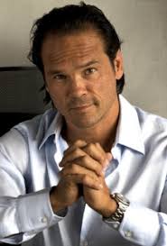 An 'American Gladiator' writes book about 'roids, life