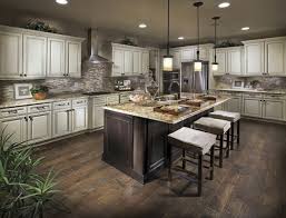 Kitchens For Colorado Families Williams Sonoma Demo Shows What Standard Pacific Is Cooking Up In Arvada Wood Floor Kitchen Antique White Kitchen Cabinets Antique White Kitchen
