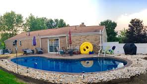 34 Kidney With Bench And Stamped Concrete By The Pool And Spa Place Of Bethel Park Pa Desert Landscaping Backyard Backyard Pool Pool Designs