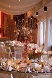 Fun Fall Wedding Centerpiece Elegant Tree Branches With Candles And Orange F Fall Wedding Centerpieces Elegant Wedding Centerpiece Flower Centerpieces Wedding