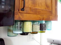 Although mason jars were made for depositing things like comfiture, jam, sauces and all sorts of other goodies you want to preserve for the winter a fun idea can be to personalize each jar by tying a colored bow around each one. Get Organized Easy Diy Mason Jar Storage