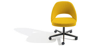 The chair is available with and without arms, and features metal or wood legs, or a swivel base. Saarinen Executive Arm Chair With Swivel Base Knoll