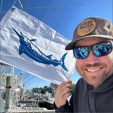 What is the best setup and location for trolling for kings around Cape  Lookout in July?