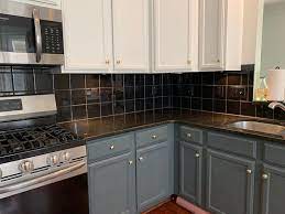 Installing a tile backsplash in your kitchen offers numerous benefits over painted or paper drywall. Painting Our 90 S Tile Backsplash Tutorial Me Reegs