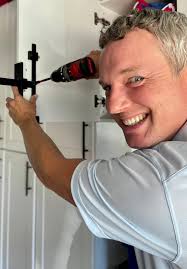 Damaged work truck with camo paint job in Springfield