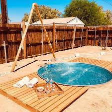 9 Best Stock Tank Pool Ideas Creative Diy Swimming Pools We Re The Joneses Diy Swimming Pool Stock Tank Pool Diy Stock Tank