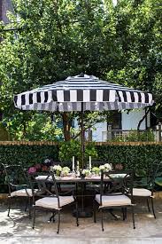 Black And White Outdoor Umbrella With Lights Outdoor Umbrellas Chic Patio Inspiration Patio Inspiration Patio Outdoor Decor