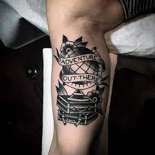 Some people show their love and appreciation for their lovers by wearing wrist tattoos. Adventure Out There Old School Travel Tattoo On Mans Bicep With Globe And Suitcases Tattoos For Guys Adventure Tattoo Globe Tattoos