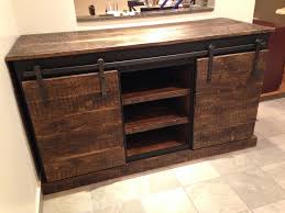 The wood's knots, texture and open grain of our livingston collection is enhanced with an expertly applied gray wash, giving this tall dresser a weathered, yet sleek look that looks classically cool in the bedroom. Sliding Barn Door Console Ana White