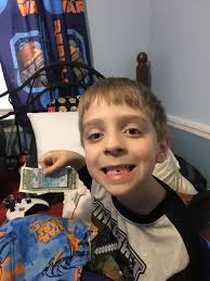 Dad the tooth fairy left me a $100 bill 😄😄