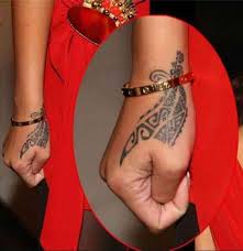 Rihanna Tattoos Photos And Explanation Rihanna Tattoo Rihanna Hand Tattoo Celebrity Tattoos