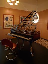 Christensen piano tilbyder service af pianoer, herunder pianostemning. Ph Grand Piano Wikipedia