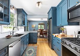 Find inspiration for finding the perfect countertop to pair with your dark cabinetry within this article's photos and helpful design advice! 5 Countertops That Look Beautiful In A Dark Blue Kitchen