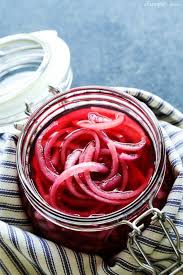 Pour a hot liquid made of water, vinegar, salt and spices on top of the onions. How To Make Quick Pickled Red Onions A Farmgirl S Dabbles