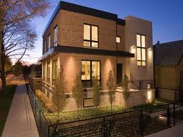 Gorgeous victorian style home featuring an exterior combination of brick and stone. Modern Exterior Brick Wall Design Trendecors