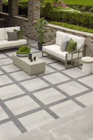 This Backyard Landscaping Design Is Inspired By Our Industria Smooth Patio Slab Industria S Square In 2020 Hardscape Backyard Backyard Patio Designs Backyard