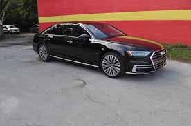 My mirror has on star/dimming and compass. Audi A8 Radar Detector And Window Tint For Gainesville Client