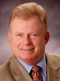 90 DL grad and head football coach Todd Lambrecht