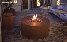 Troja Rund Aus Cortenstahl Mit Gasfeuereinsatz Und Edelstahl Untersetzer Cortenstahl Edelstahl Stahl