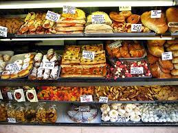 A Bakery Window Display In Venice Italy Bakery Bread Shop Culinary
