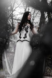 Traditional white meets steampunk with this elegant fairytale gown. Gothic Wedding Corset Black And White Corset Steampunk Etsy